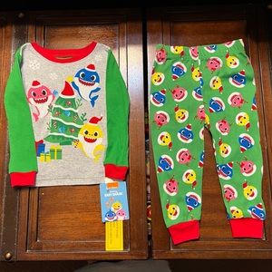 NWT Baby Shark Pajama These are new with no stainss. Comes from smoke free home.